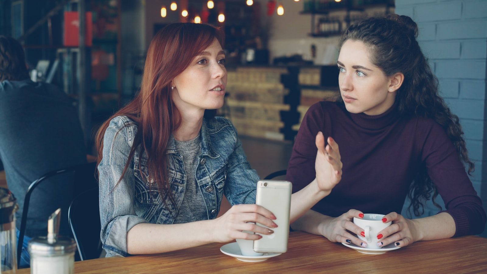A sales conversation across a meeting table